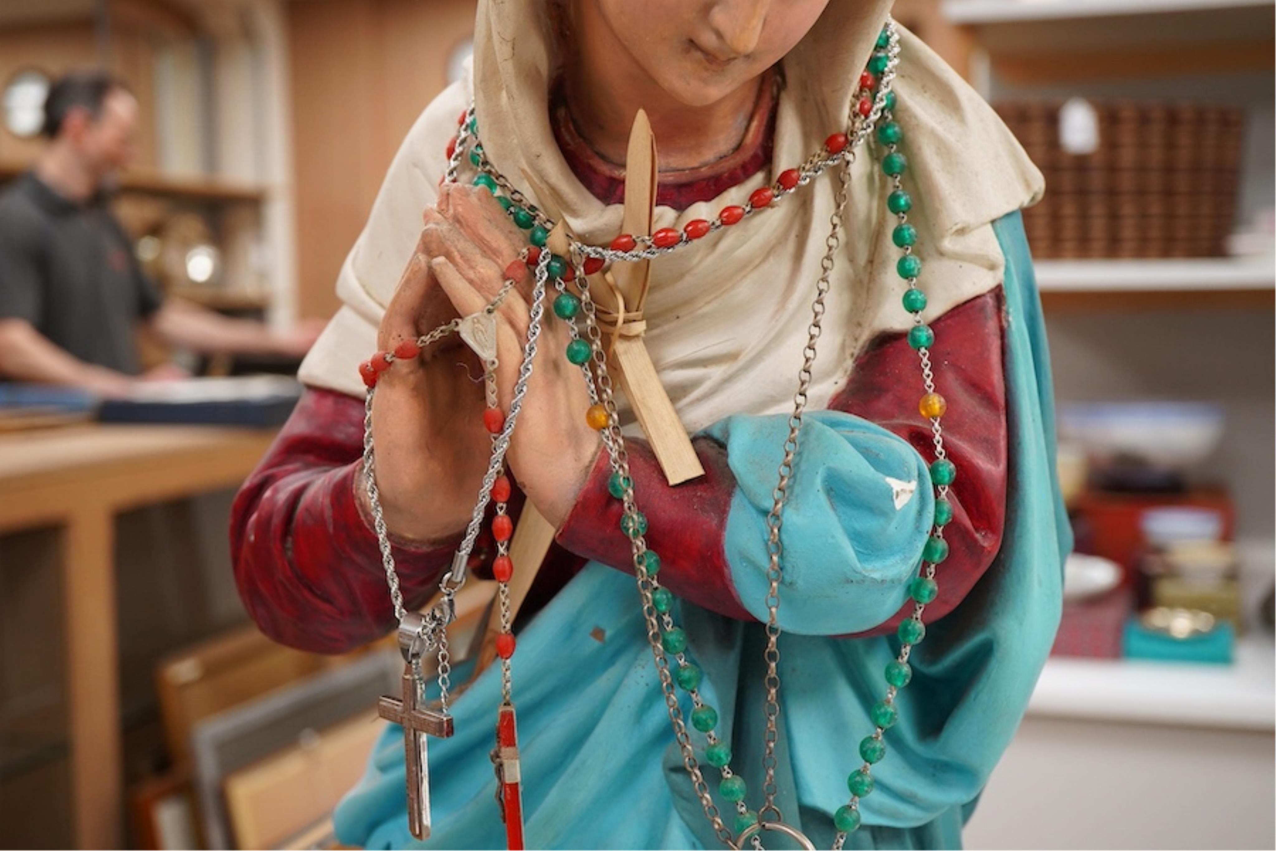 A plaster figure of Madonna at prayer, 61cm